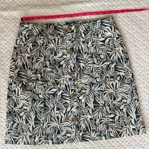 Size 4 blue and white print skirt with decorative buttons